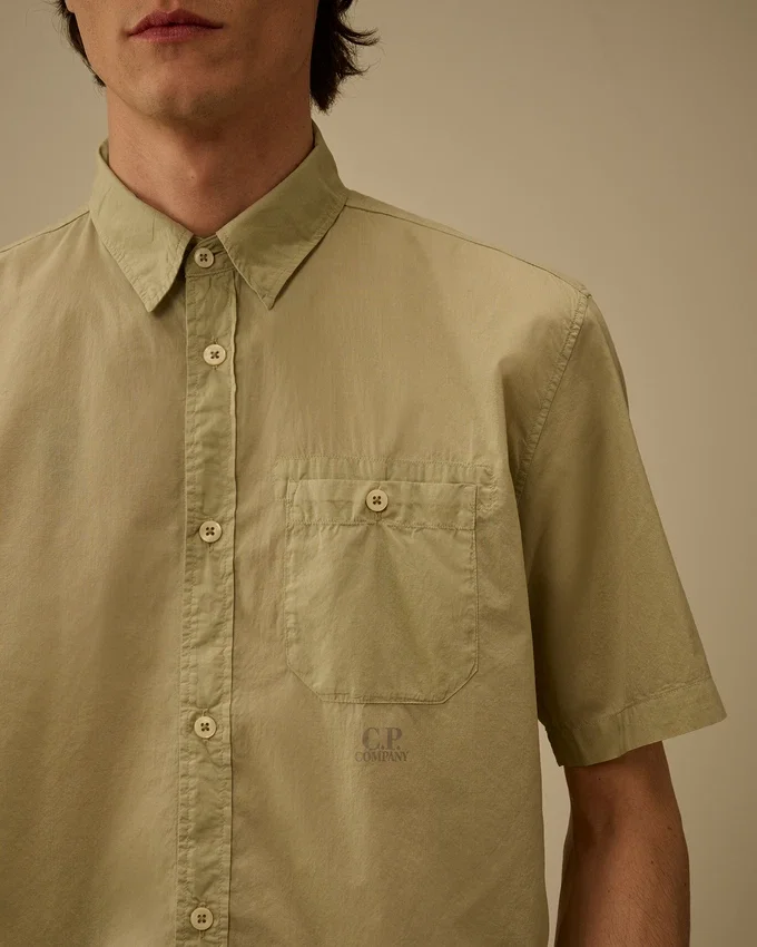 Camicia a maniche corte con bottoni in mussola leggera