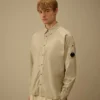 Camicia a maniche lunghe in popeline con bottoni a forma di lente