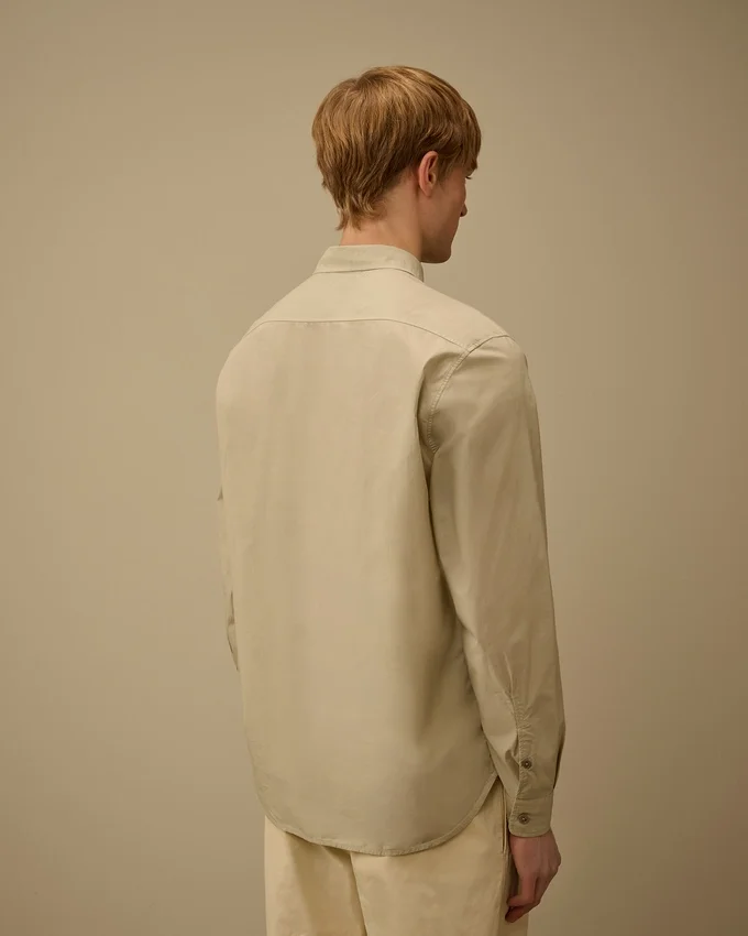 Camicia a maniche lunghe in popeline con bottoni a forma di lente