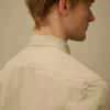 Camicia a maniche lunghe in popeline con bottoni a forma di lente