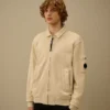 Felpa con zip in pile di cotone a trama diagonale e lente