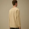 Maglione in cotone Sea Island con dettaglio a forma di Lens