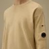Maglione in cotone Sea Island con dettaglio a forma di Lens