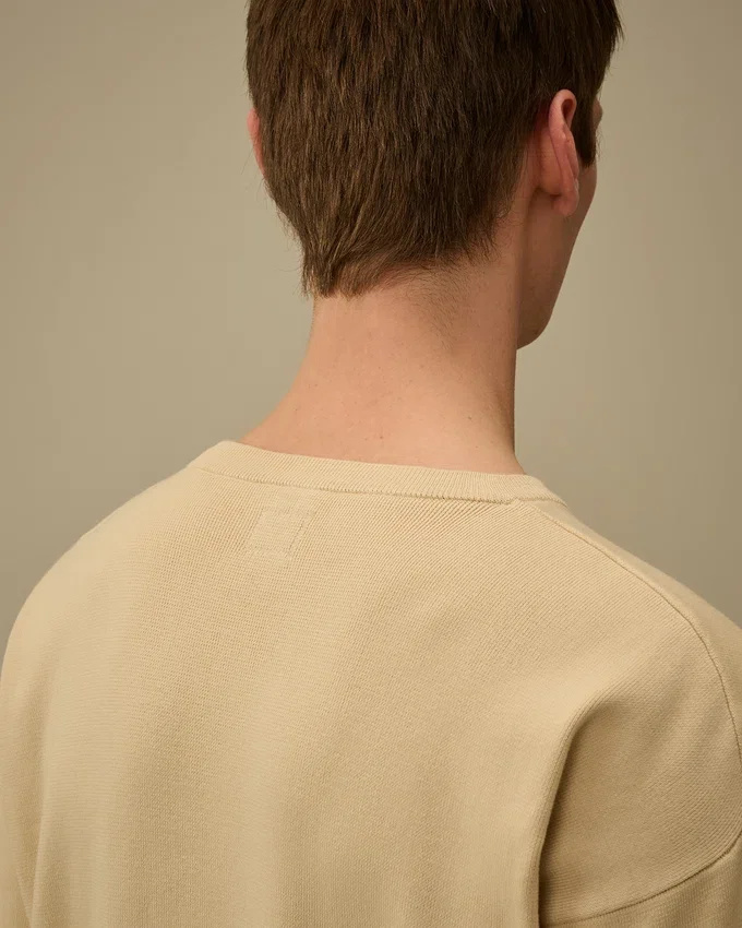Maglione in cotone Sea Island con dettaglio a forma di Lens