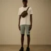 Pantaloncini in pile leggero con tasche cargo e logo Lens