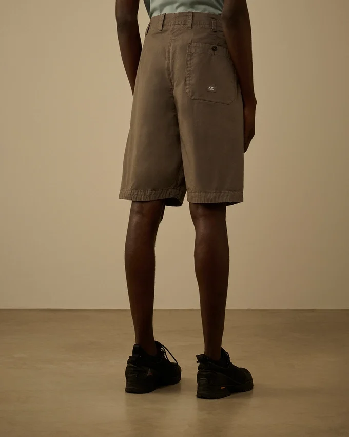 Pantaloncini larghi con pinces in gabardina di cotone