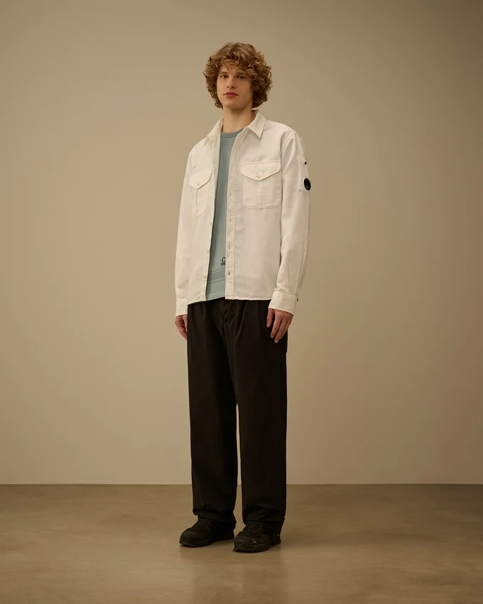 Pantaloni larghi con pinces in gabardina di cotone