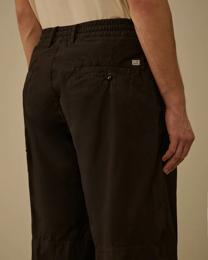 Pantaloni Micro-Reps a gamba squadrata con tasche a lente