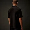 Polo a maniche corte con mezza zip in jersey mercerizzato della Metropolis Series