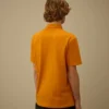 Polo a maniche corte con taschino sul petto in piquet elasticizzato