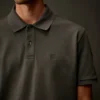Polo a maniche corte in piquet elasticizzato della Metropolis Series