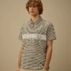 Polo con logo a maniche corte in jersey stampato 20/1