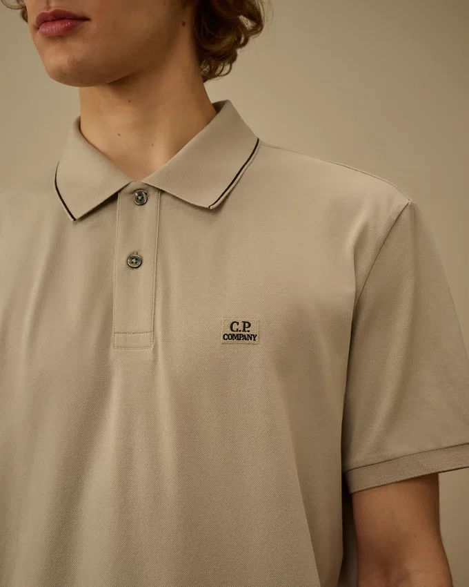 Polo con logo a maniche corte in piquet elasticizzato